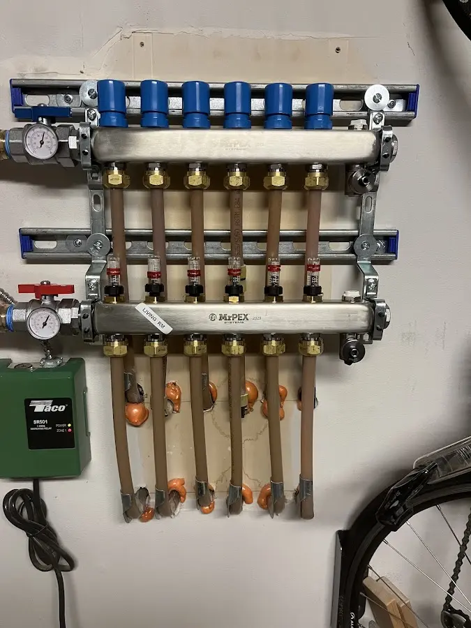 Plumber performing Water Heater Repair at a residential property in West Little River