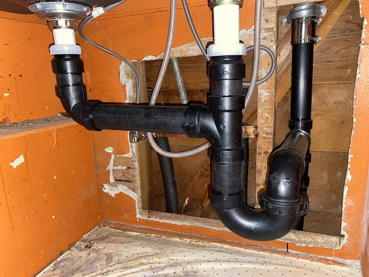 Professional Garbage Disposal Repair equipment and tools on the job in West Little River